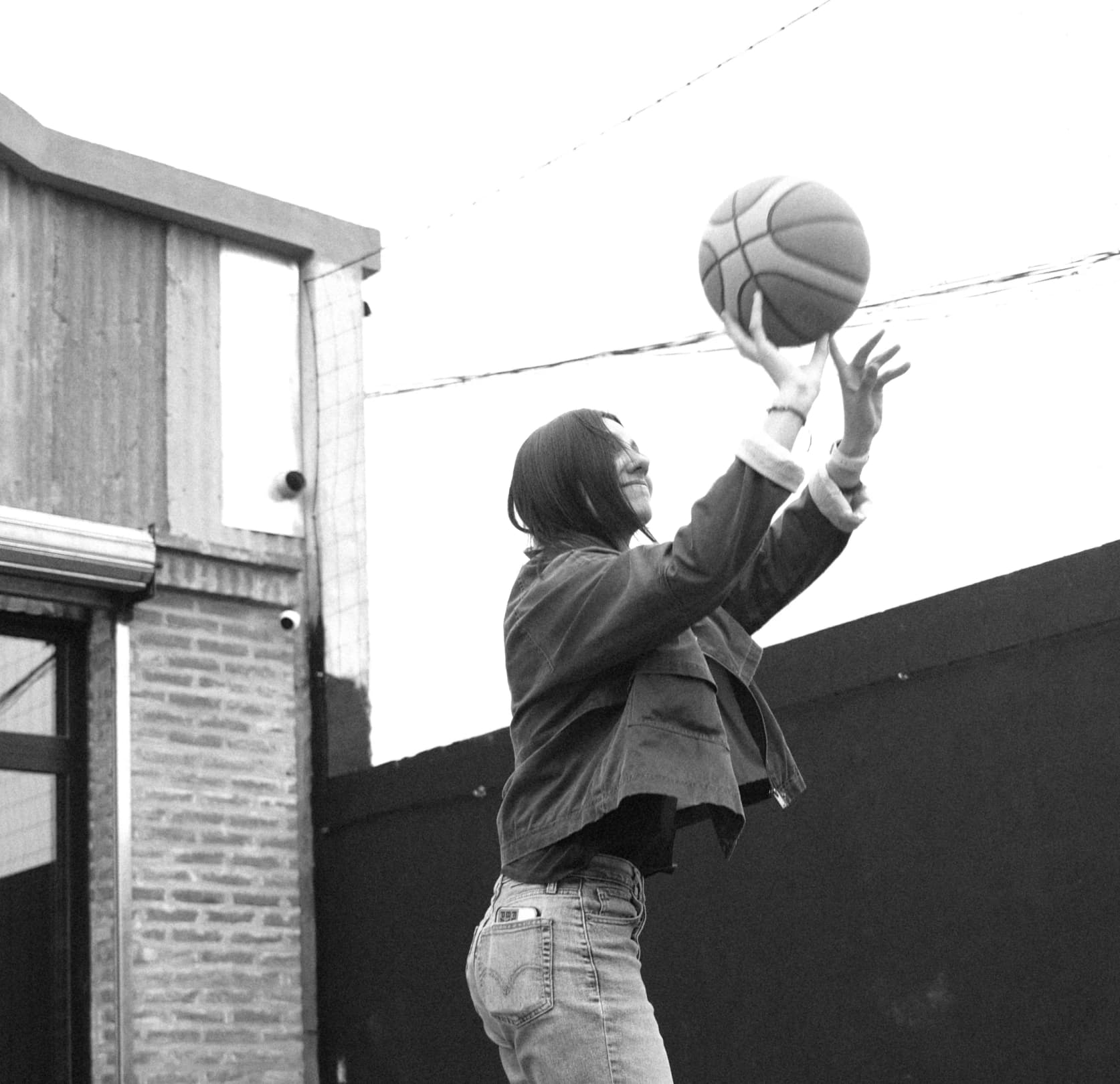 A girl playing basketball